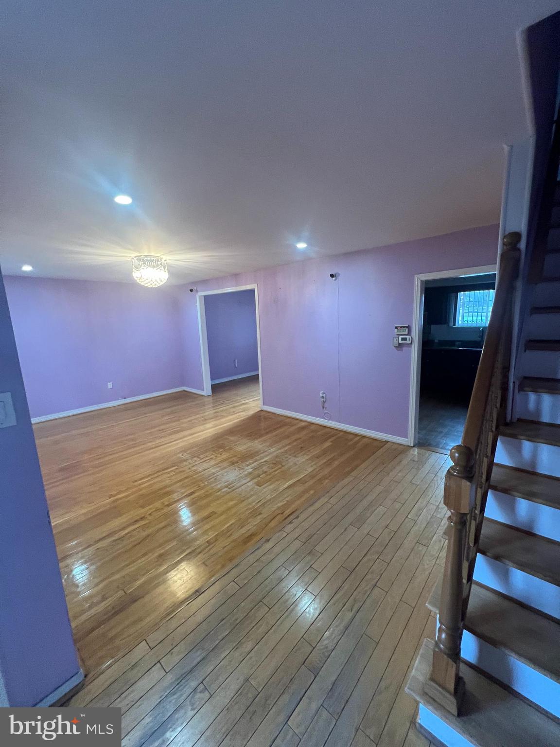 2561 Burning Tree Road Pennsauken, NJ 08109 - Photo 16 of 59 a view of an empty room with wooden floor and stairs