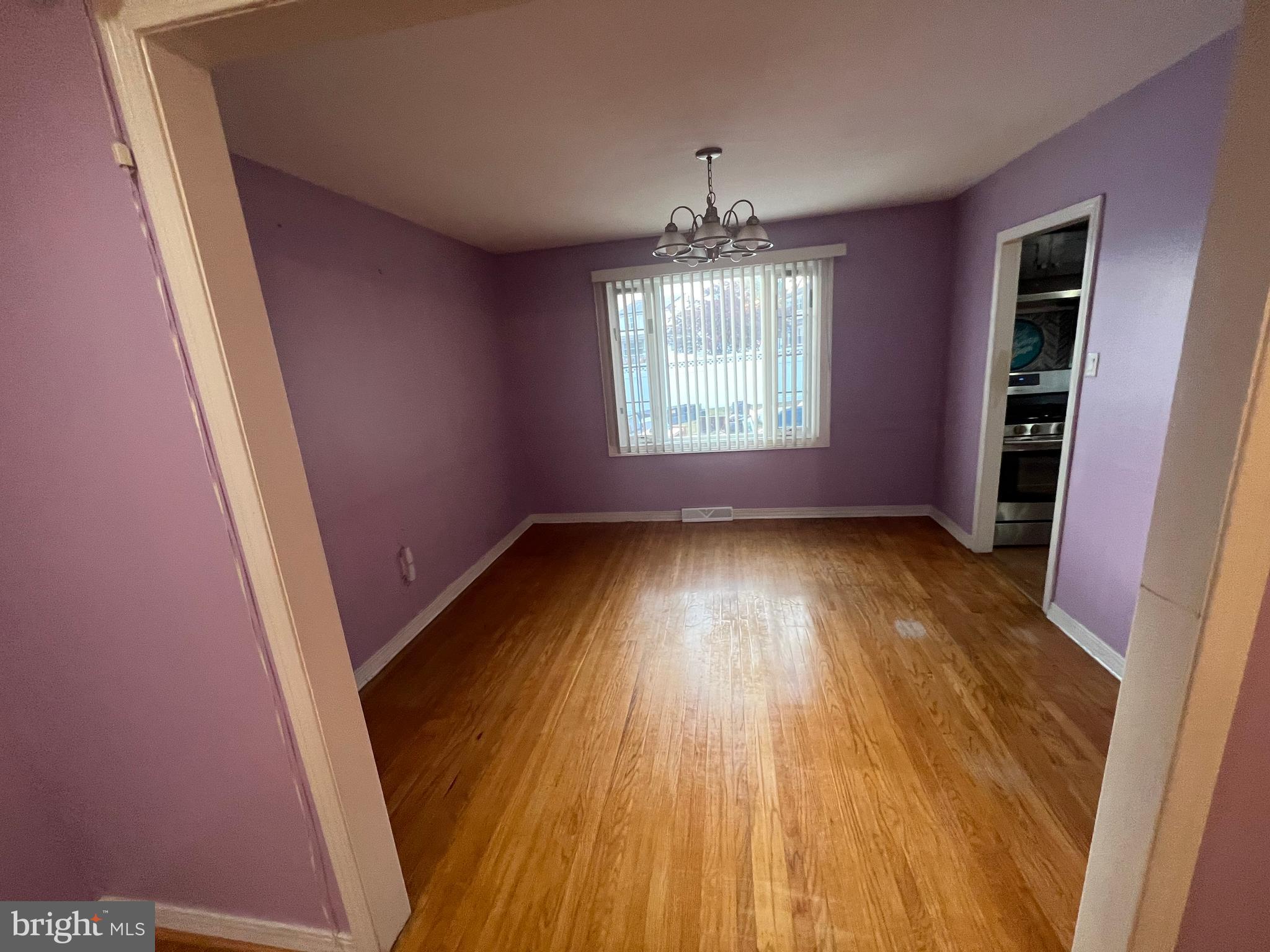 2561 Burning Tree Road Pennsauken, NJ 08109 - Photo 20 of 59 wooden floor in an empty room with a window