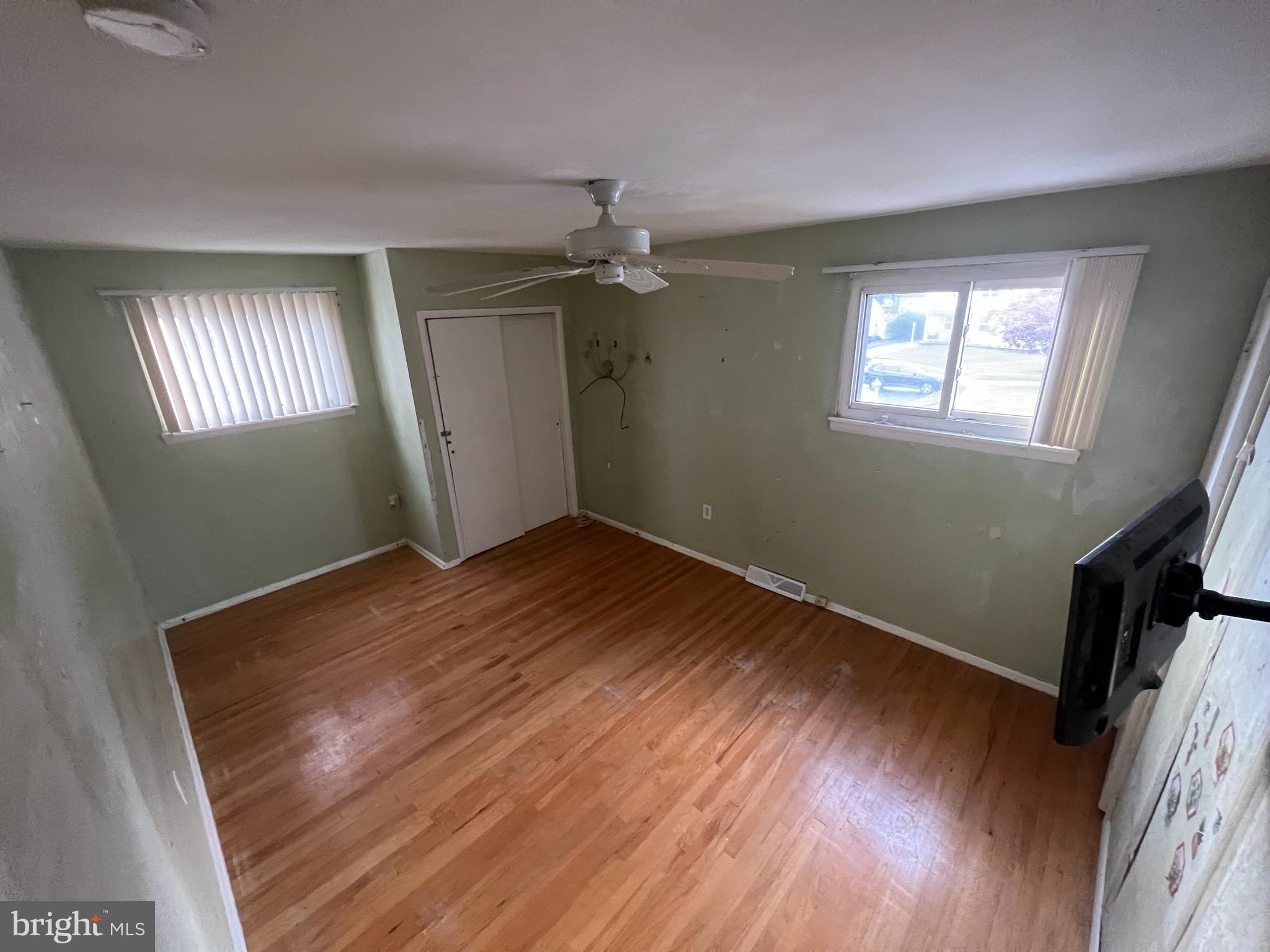 2561 Burning Tree Road Pennsauken, NJ 08109 - Photo 31 of 59 a view of empty room with wooden floor and fan