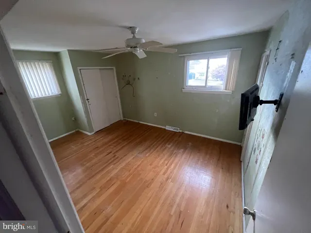 a view of bathroom with toilet shower