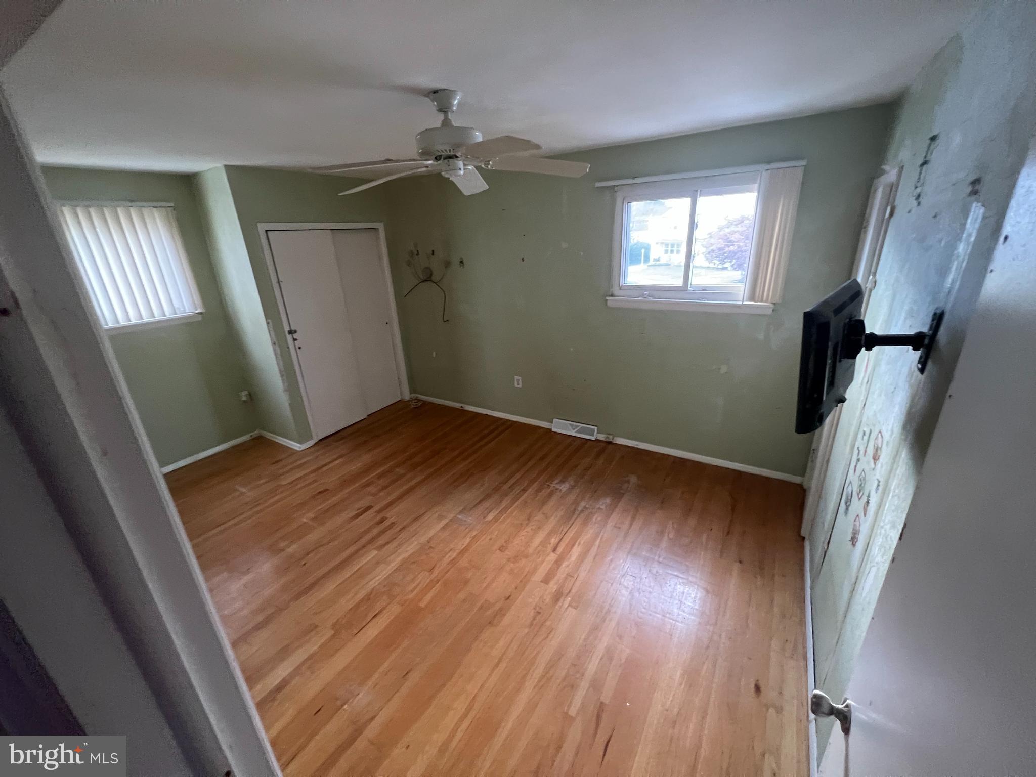 2561 Burning Tree Road Pennsauken, NJ 08109 - Photo 32 of 59 wooden floor in an empty room with a mirror