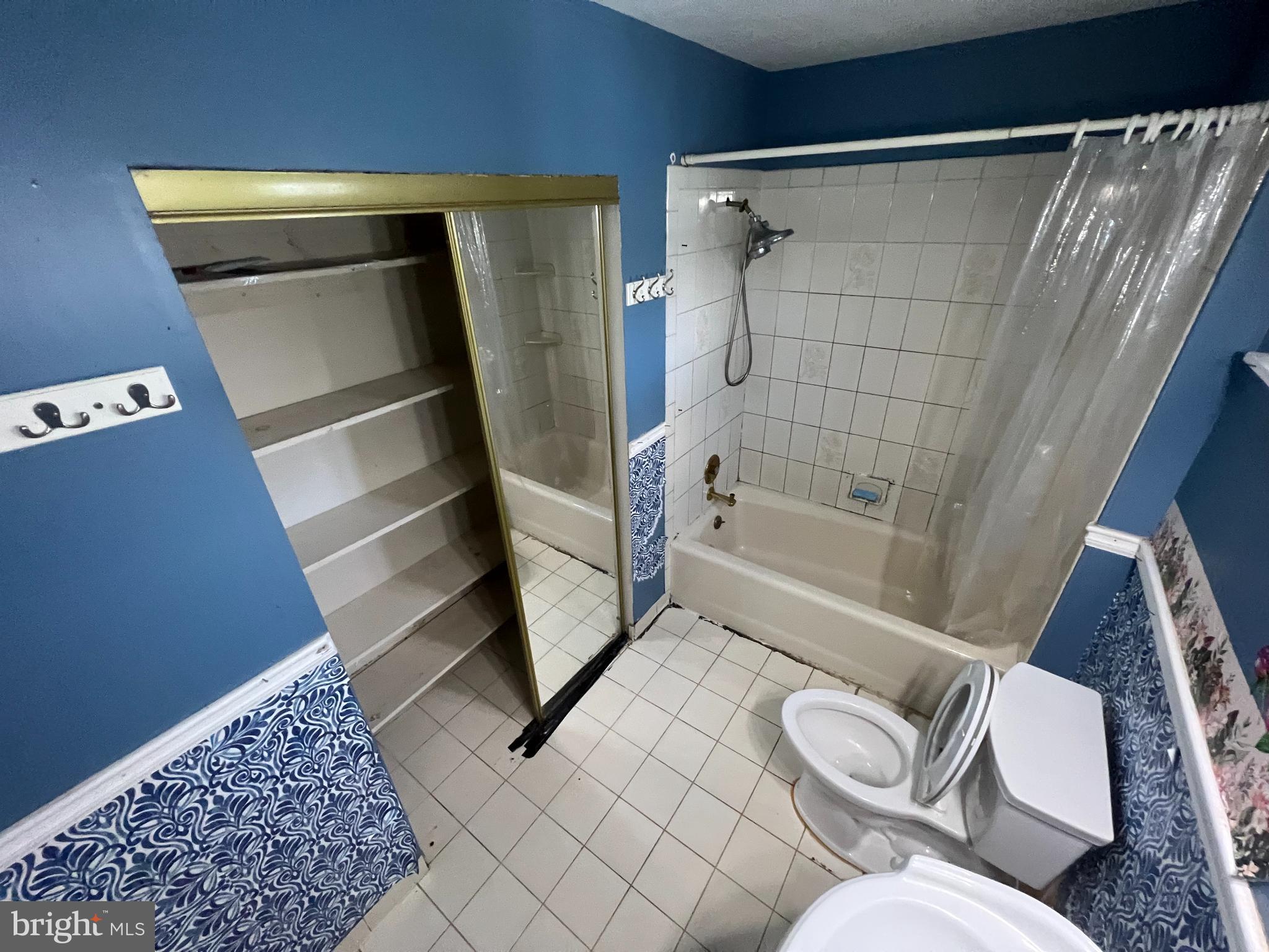 2561 Burning Tree Road Pennsauken, NJ 08109 - Photo 34 of 59 a bathroom with a sink a toilet and shower