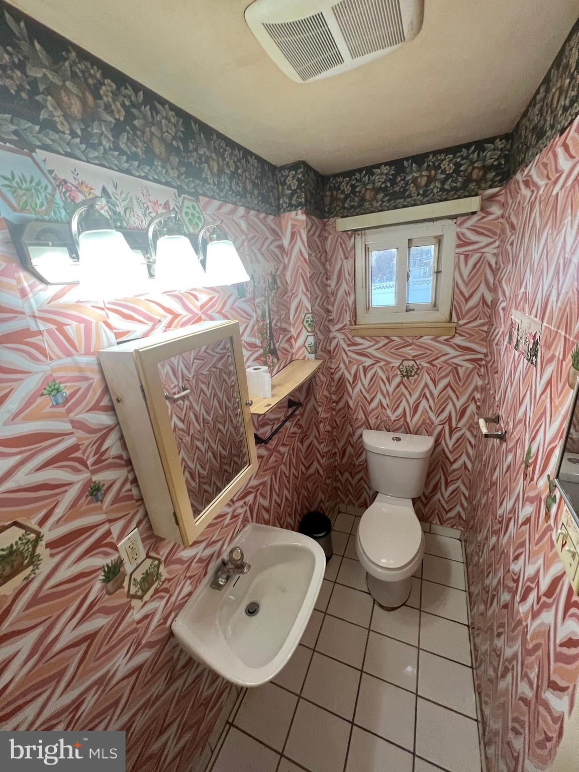 2561 Burning Tree Road Pennsauken, NJ 08109 - Photo 38 of 59 a bathroom with a sink toilet and mirror