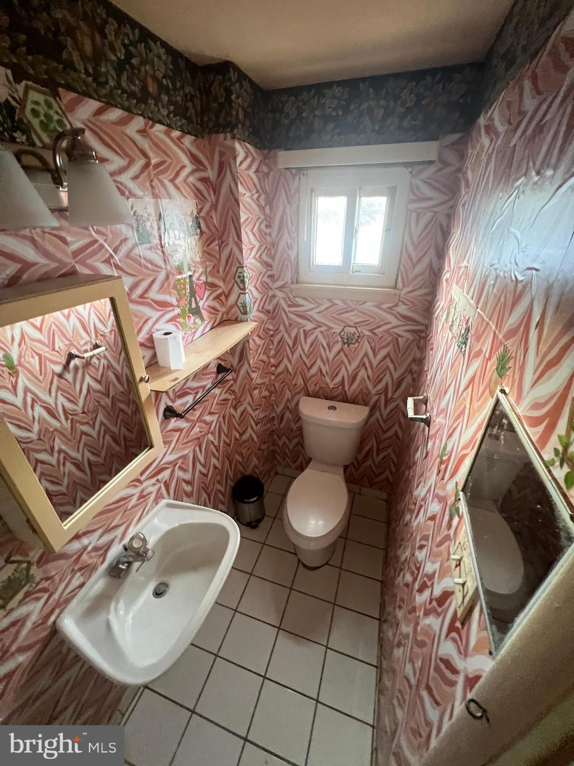 2561 Burning Tree Road Pennsauken, NJ 08109 - Photo 39 of 59 a bathroom with a toilet sink and mirror