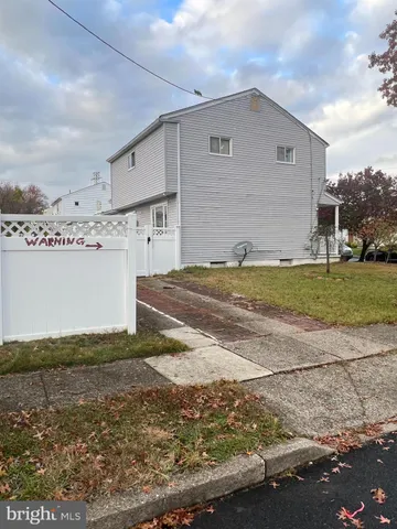 a view of a kitchen with a sink and dishwasher