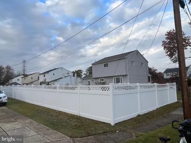 a view of a house with a street