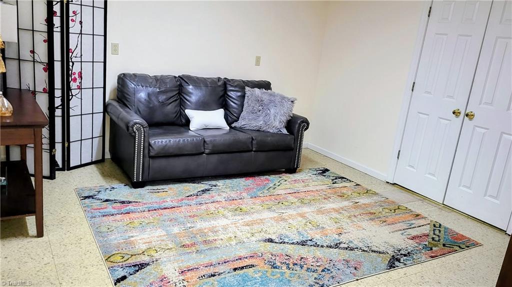 7035 Skylark Road Pfafftown, NC 27040 - Photo 33 of 47 Versatile Lower-Level Flex Space for Exercise, Games or Sleepovers!