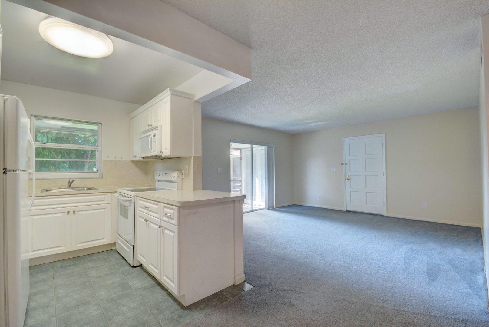 1074 Northwest 13th Street, Unit 273C Boca Raton, FL 33486 - Photo 16 of 27 kitchen,living