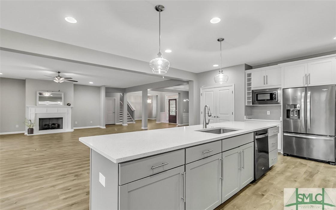 653 Wyndham Way Pooler, GA 31322 - Photo 9 of 48 Kitchen is open to the living room