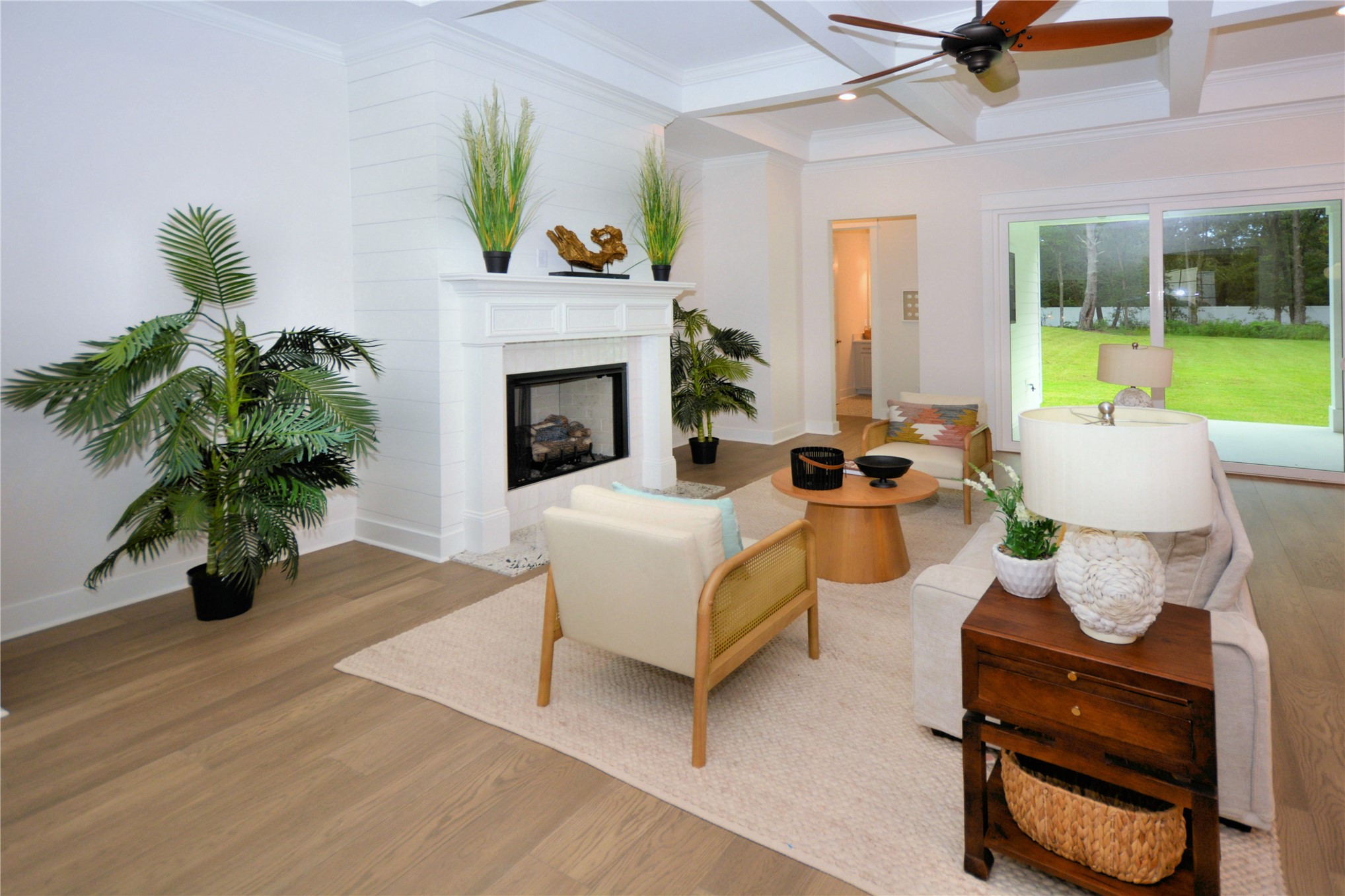 2646 Bailey Road Fernandina Beach, FL 32034 - Photo 19 of 42 a living room with furniture potted plant and a fireplace