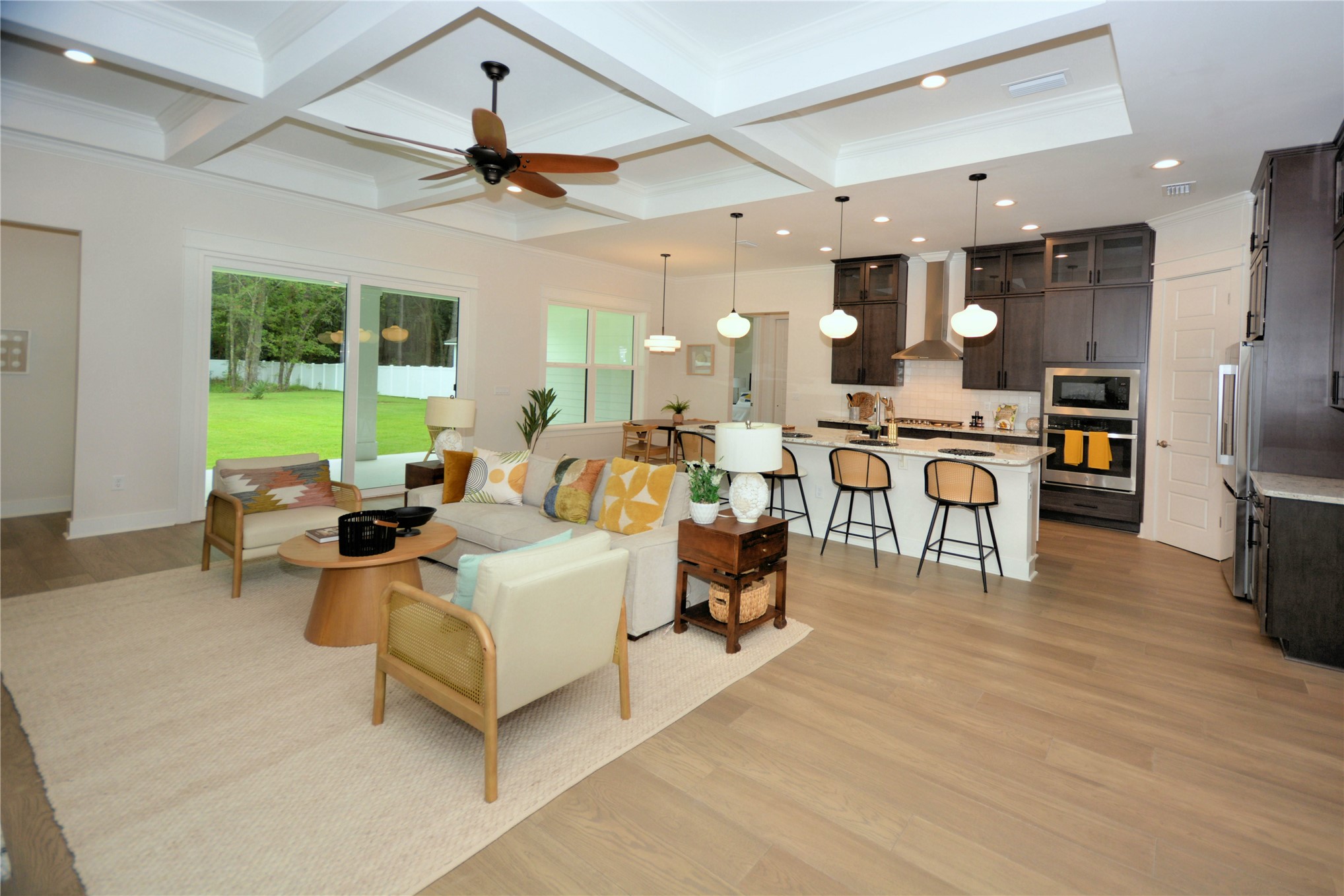 2646 Bailey Road Fernandina Beach, FL 32034 - Photo 20 of 42 a living room with furniture kitchen view and a large window