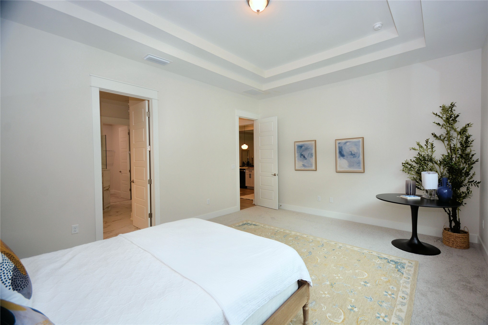 2646 Bailey Road Fernandina Beach, FL 32034 - Photo 27 of 42 a bedroom with a bed and a potted plant