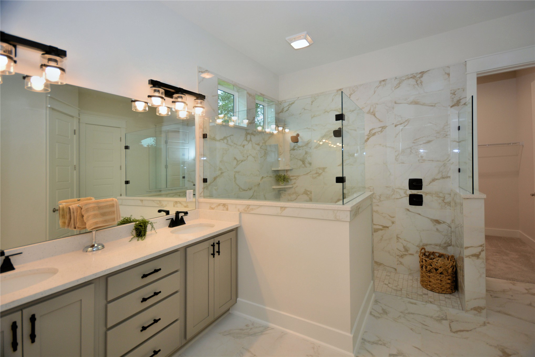 2646 Bailey Road Fernandina Beach, FL 32034 - Photo 28 of 42 a spacious bathroom with double sink and a mirror