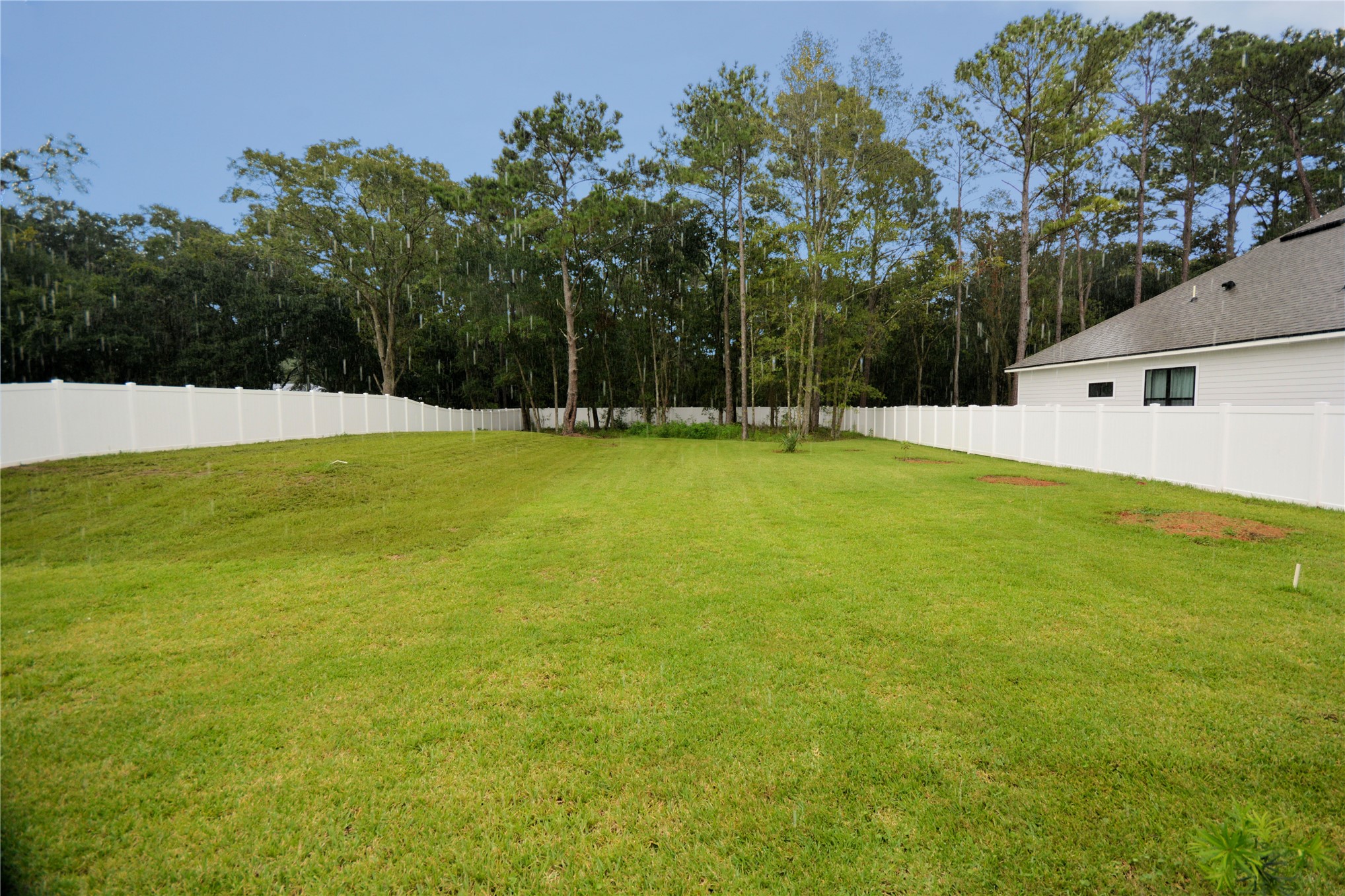 2646 Bailey Road Fernandina Beach, FL 32034 - Photo 37 of 42 a swimming pool with trees in the background