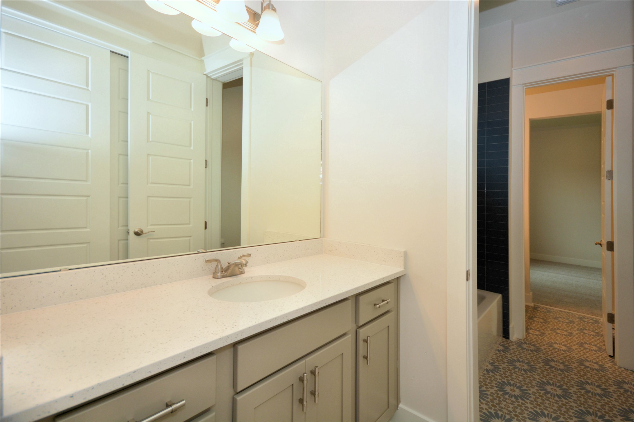 2646 Bailey Road Fernandina Beach, FL 32034 - Photo 41 of 42 a bathroom with a sink and a mirror