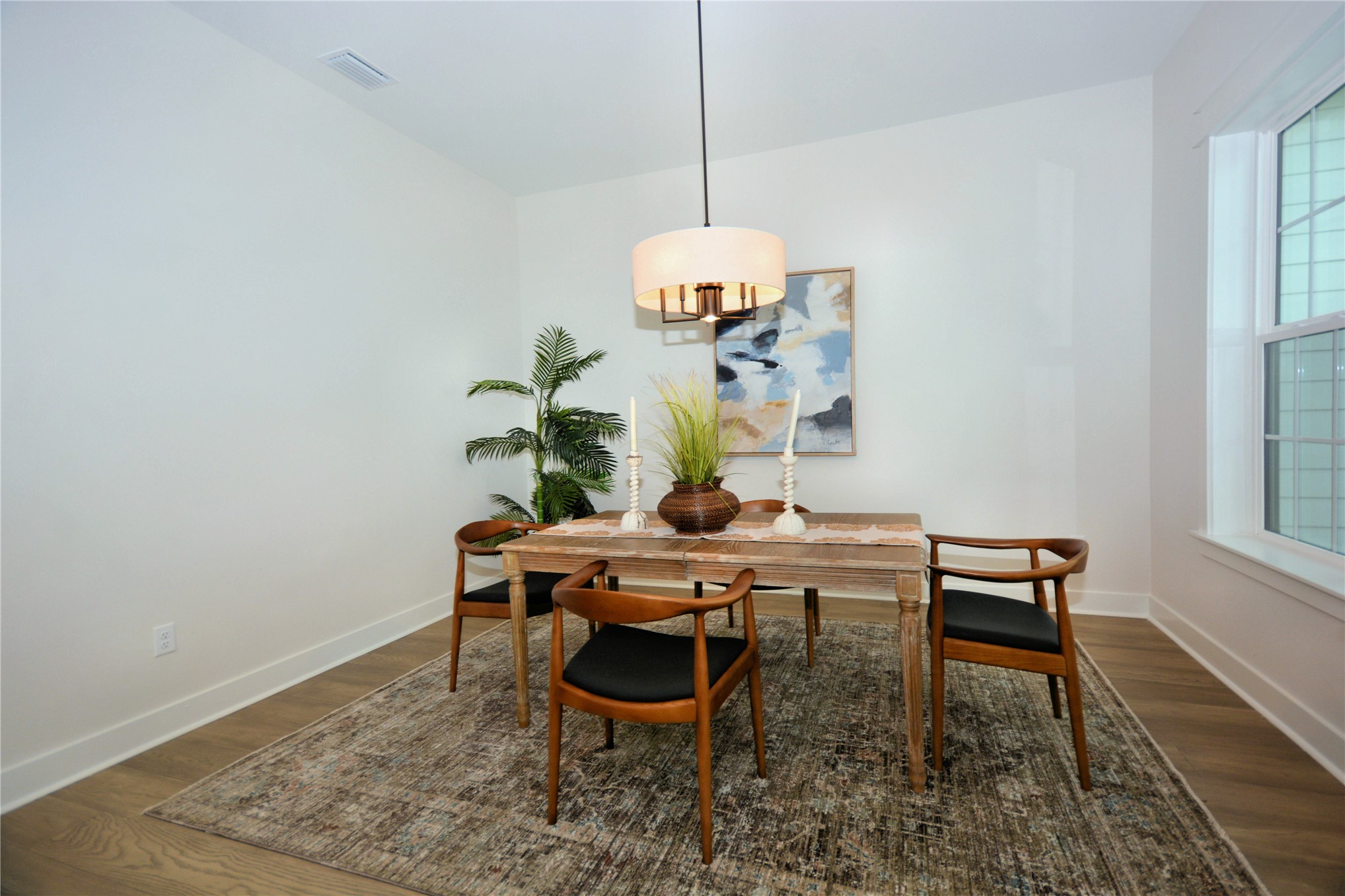 2646 Bailey Road Fernandina Beach, FL 32034 - Photo 7 of 42 a view of a dining room with furniture and wooden floor