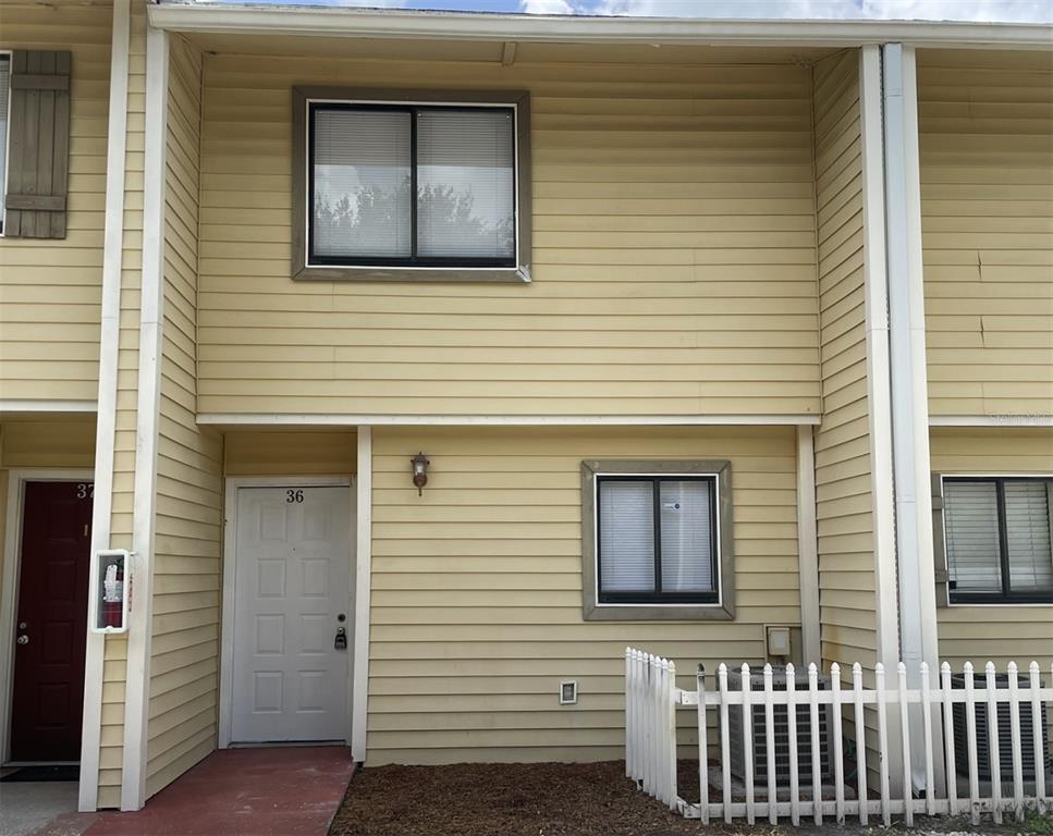 22706 Gage Loop, Unit 36 Land O' Lakes, FL 34639 - Photo 1 of 1 a view of front door of house