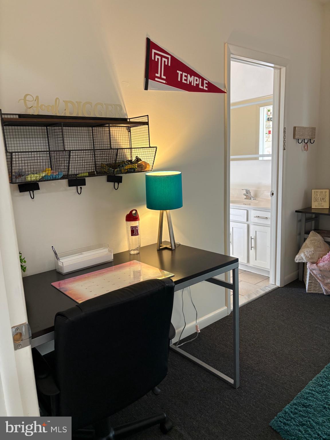 1000 Diamond Street, Unit A Philadelphia, PA 19122 - Photo 13 of 24 a room with table chairs and wooden floor