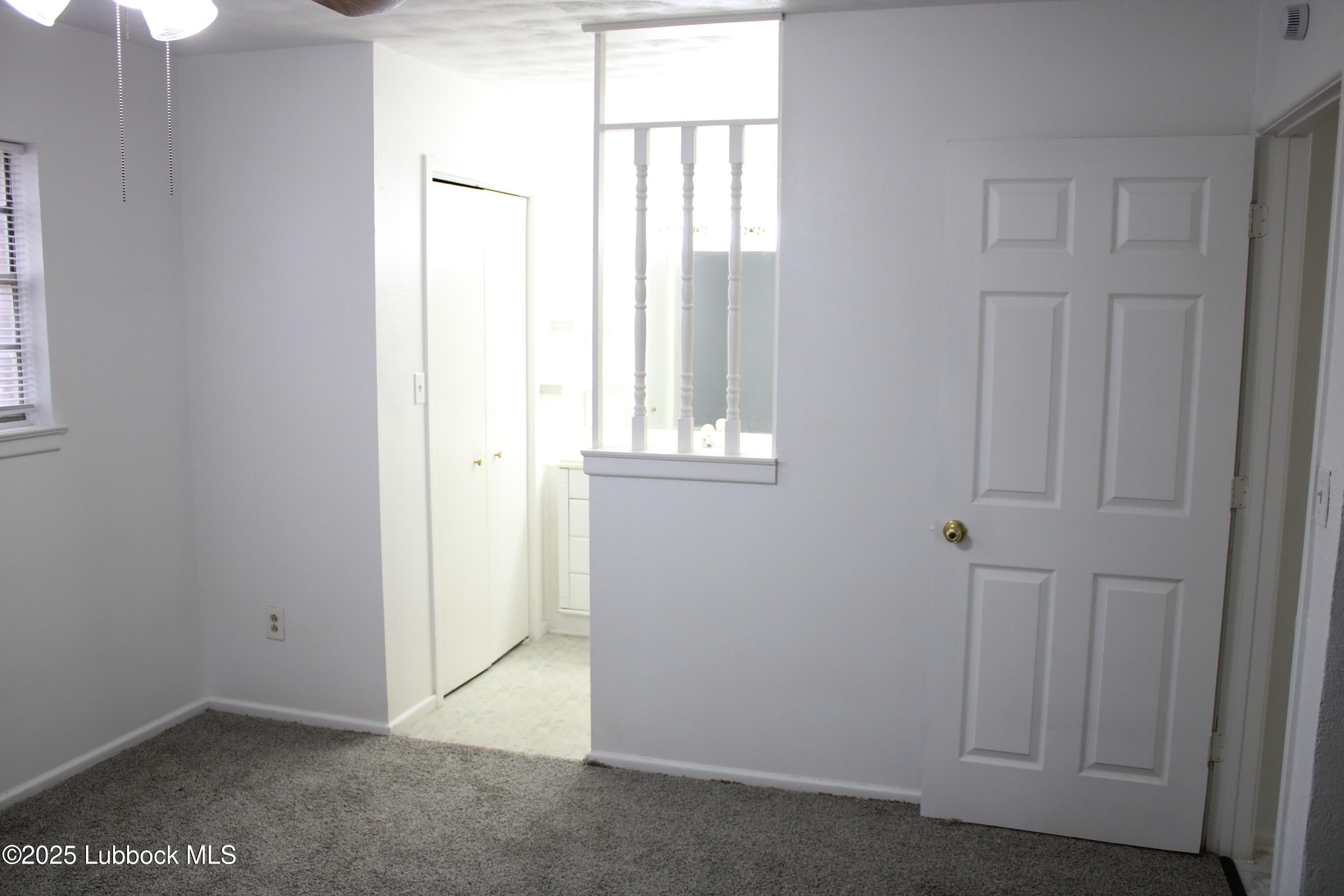 5503 36th Street Lubbock, TX 79407 - Photo 12 of 22 an empty room with windows
