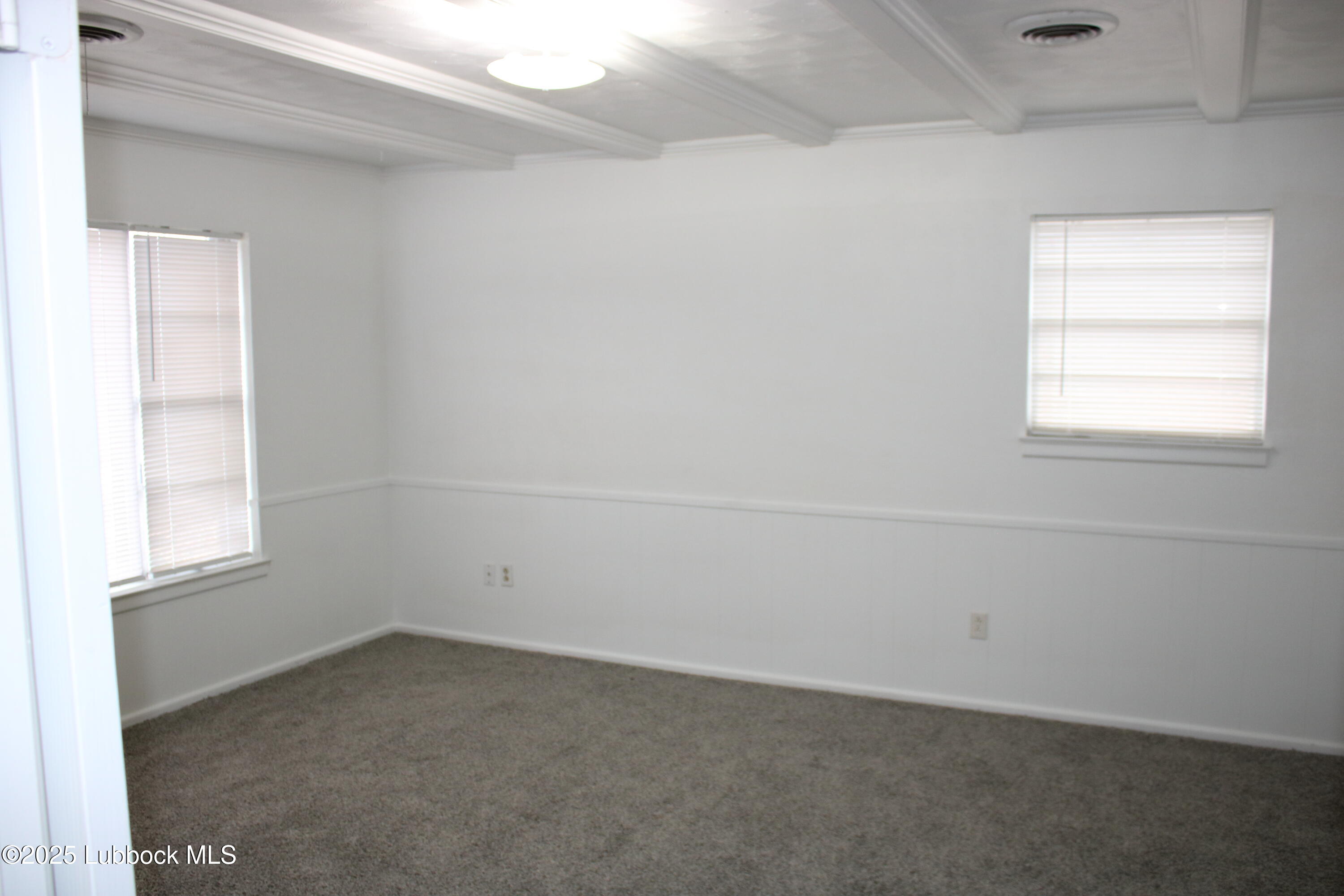 5503 36th Street Lubbock, TX 79407 - Photo 16 of 22 an empty room with a window