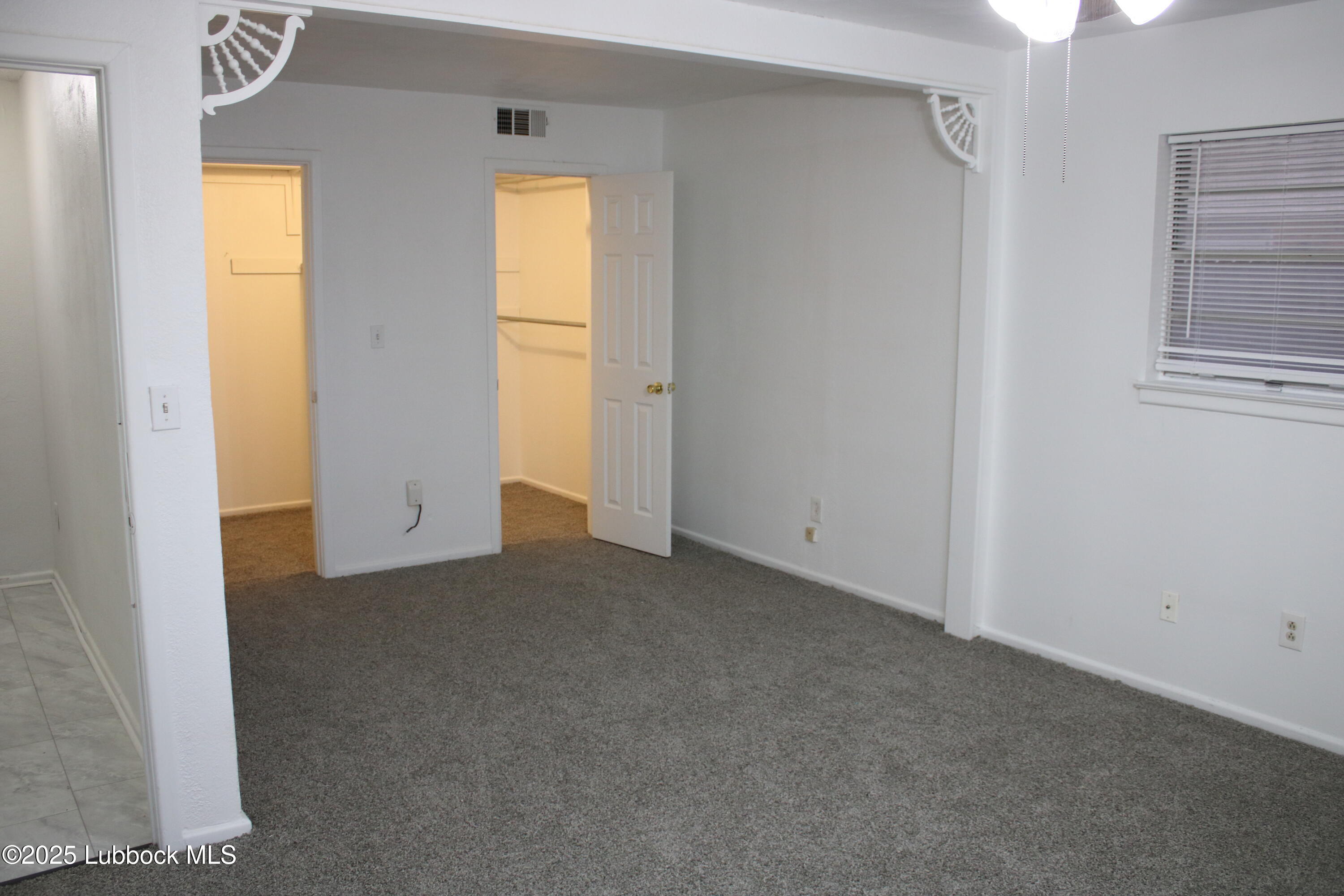 5503 36th Street Lubbock, TX 79407 - Photo 10 of 22 a view of empty room with window