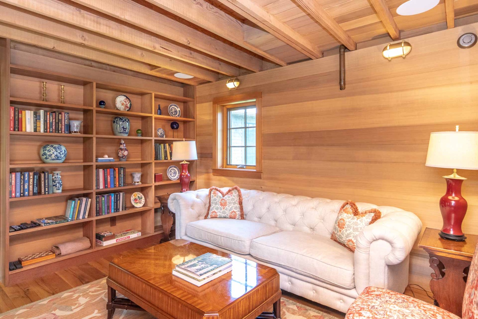 15 Old Farm Road Chilmark, MA 02535 - Photo 15 of 51 a living room with furniture and a book shelf