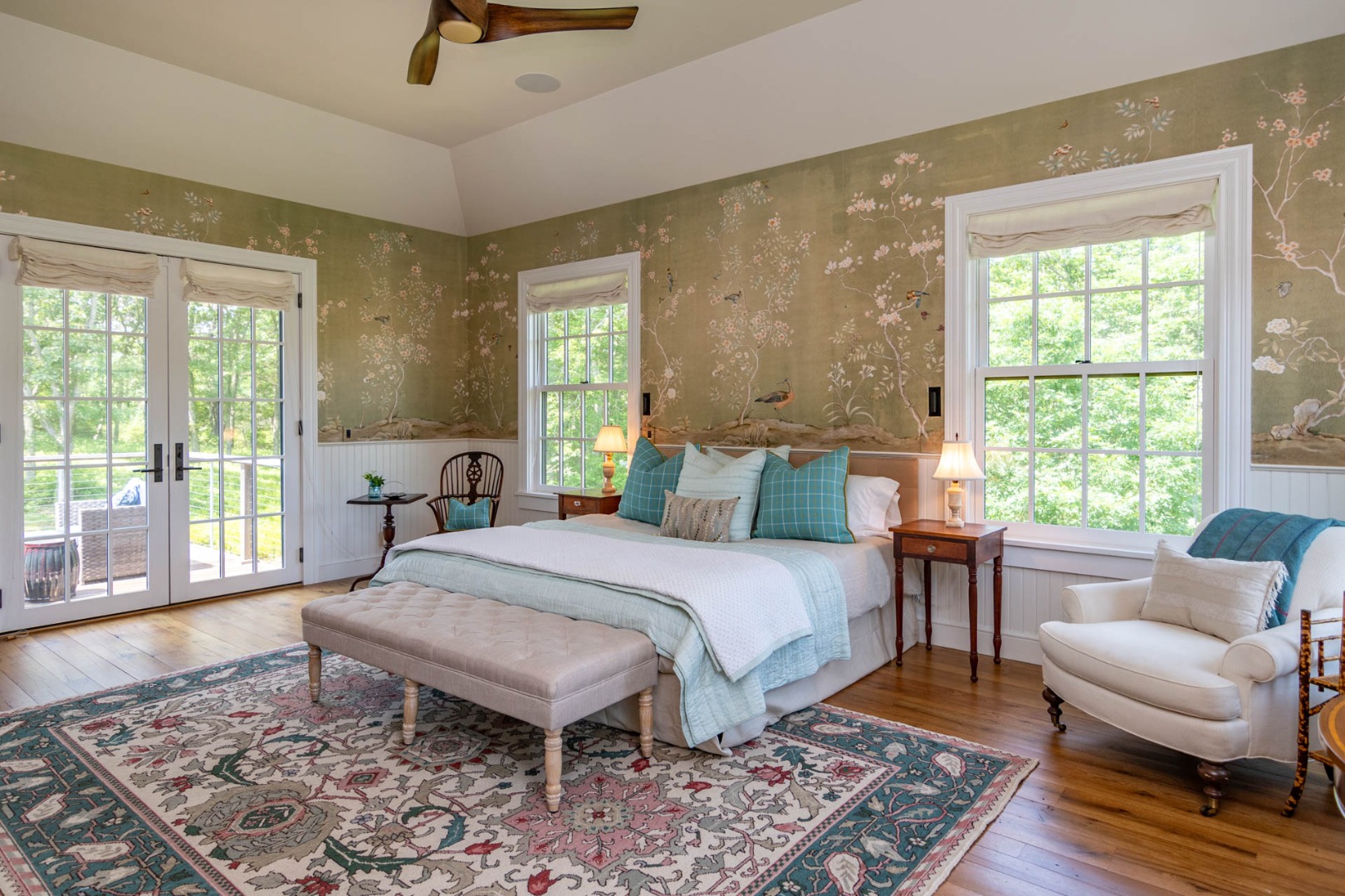 15 Old Farm Road Chilmark, MA 02535 - Photo 18 of 51 a spacious bedroom with a bed a couch and a large window