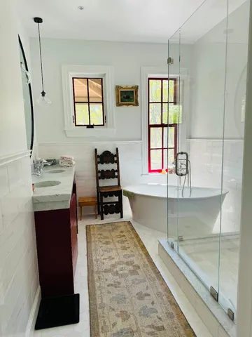 a kitchen with stainless steel appliances granite countertop a sink stove and a refrigerator