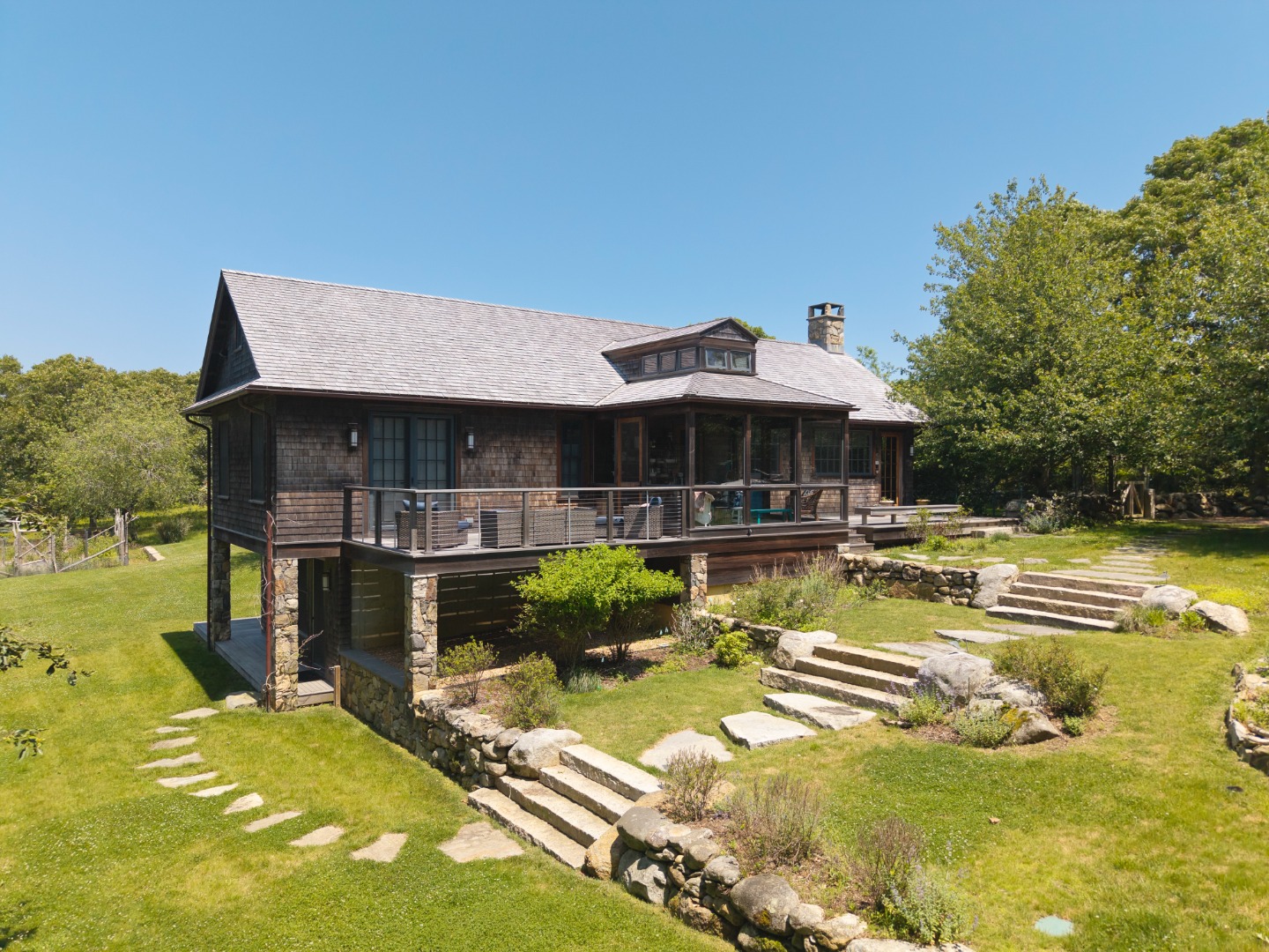 15 Old Farm Road Chilmark, MA 02535 - Photo 2 of 51 a view of a house with swimming pool and sitting area