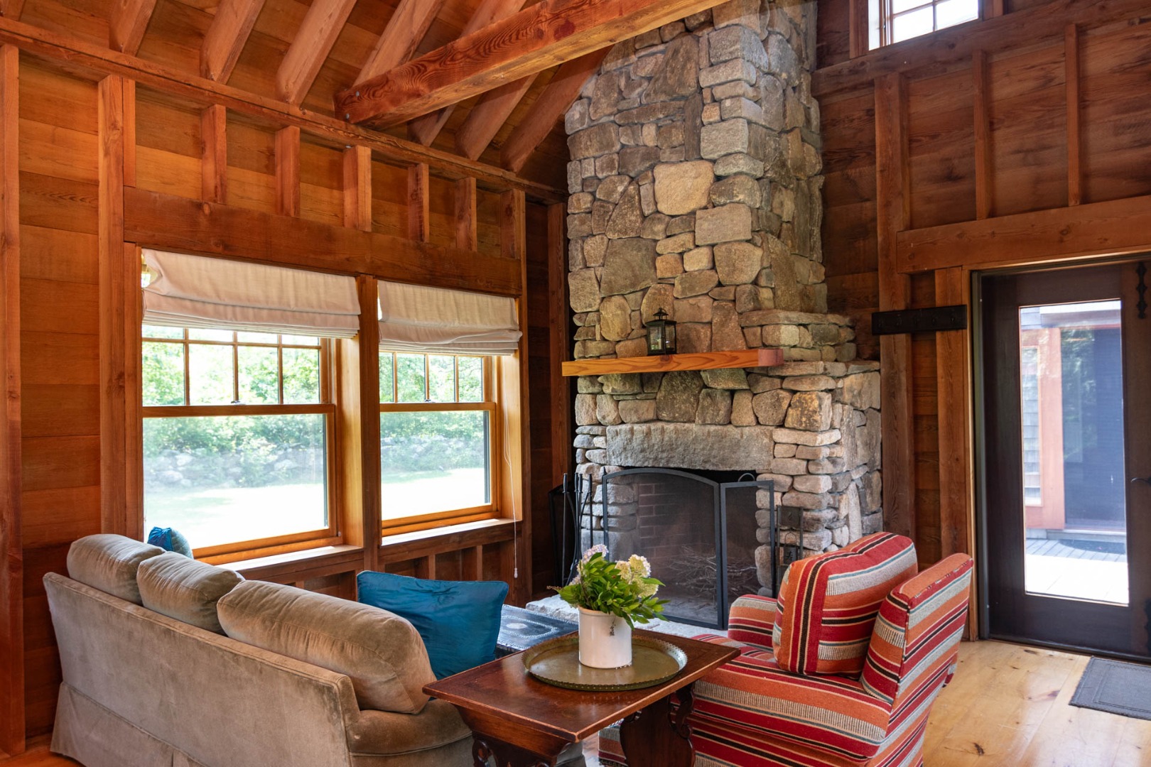 15 Old Farm Road Chilmark, MA 02535 - Photo 28 of 51 a living room with furniture a fireplace and a window