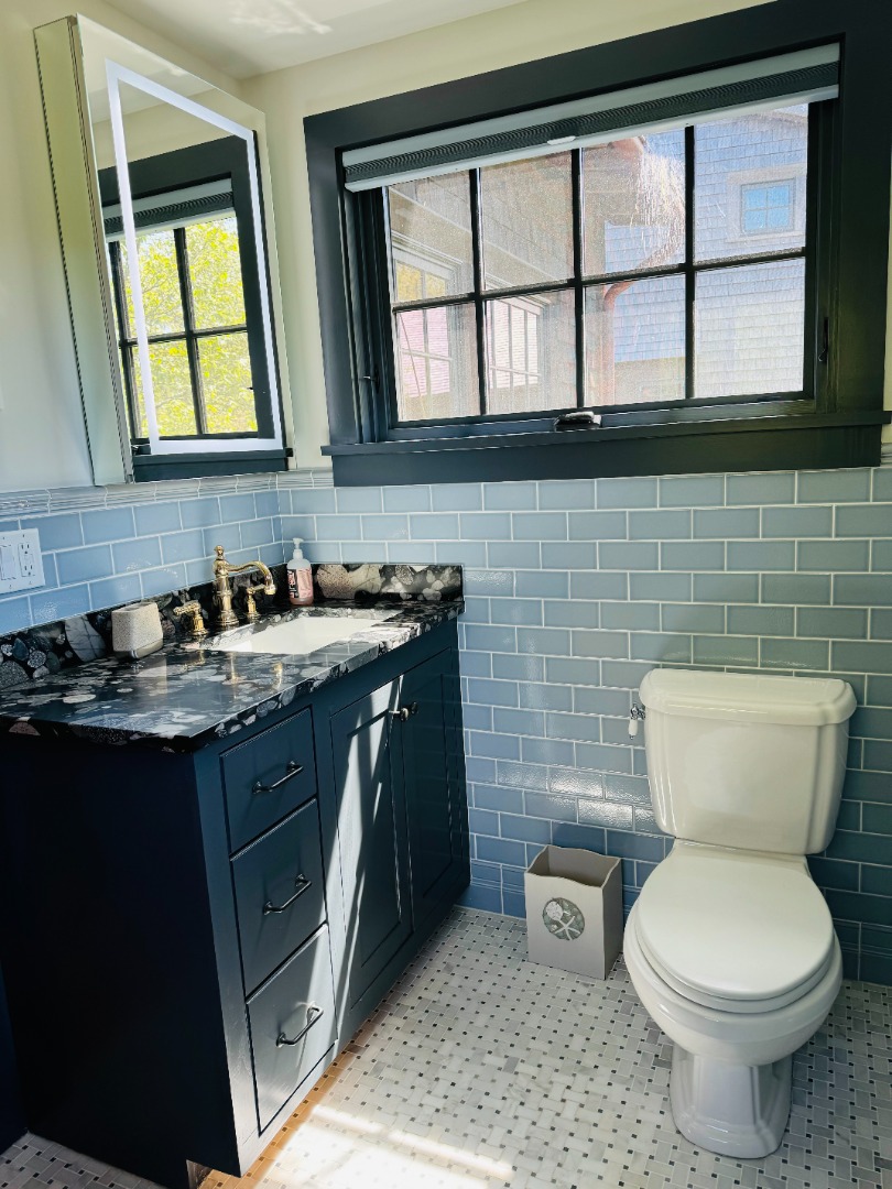 15 Old Farm Road Chilmark, MA 02535 - Photo 30 of 51 a bathroom with a toilet sink and mirror