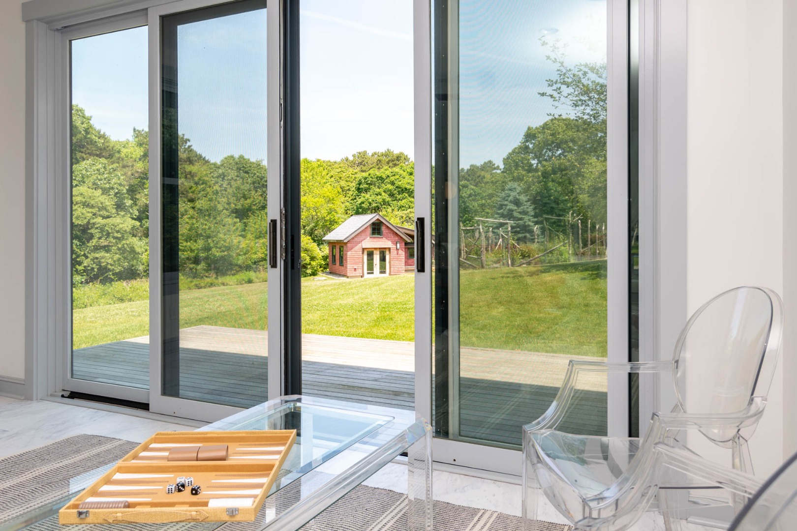 15 Old Farm Road Chilmark, MA 02535 - Photo 35 of 51 a view of a living room and floor to ceiling window