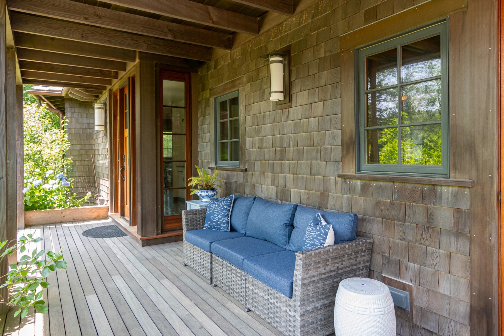 15 Old Farm Road Chilmark, MA 02535 - Photo 41 of 51 a view of a couches in the patio with potted plants