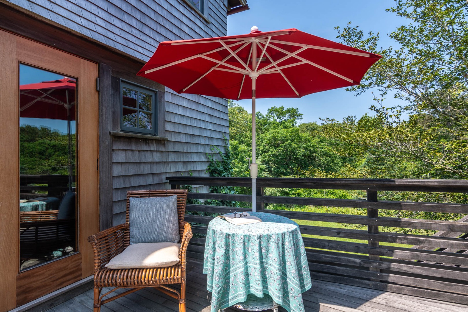 15 Old Farm Road Chilmark, MA 02535 - Photo 42 of 51 a view of a chair and table on the deck