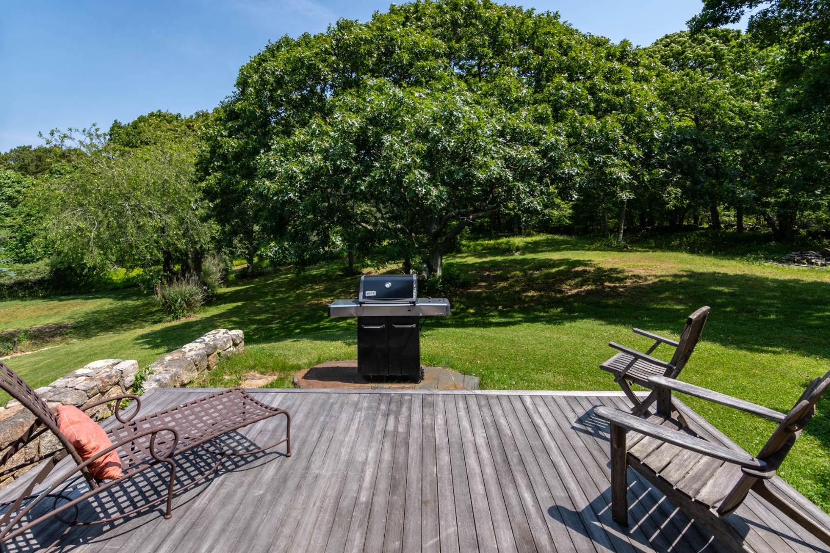 15 Old Farm Road Chilmark, MA 02535 - Photo 44 of 51 a view of a wooden deck and a patio