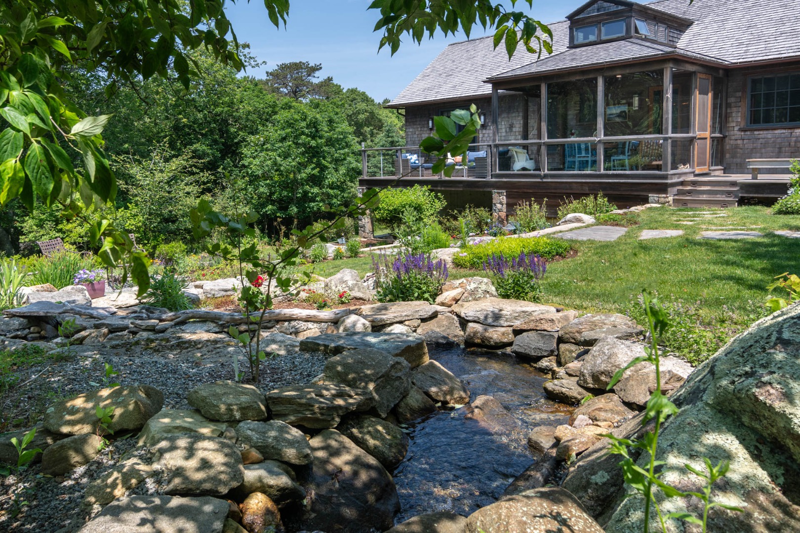 15 Old Farm Road Chilmark, MA 02535 - Photo 45 of 51 a view of a house with a yard and sitting area