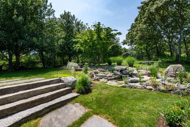 a view of a backyard with garden