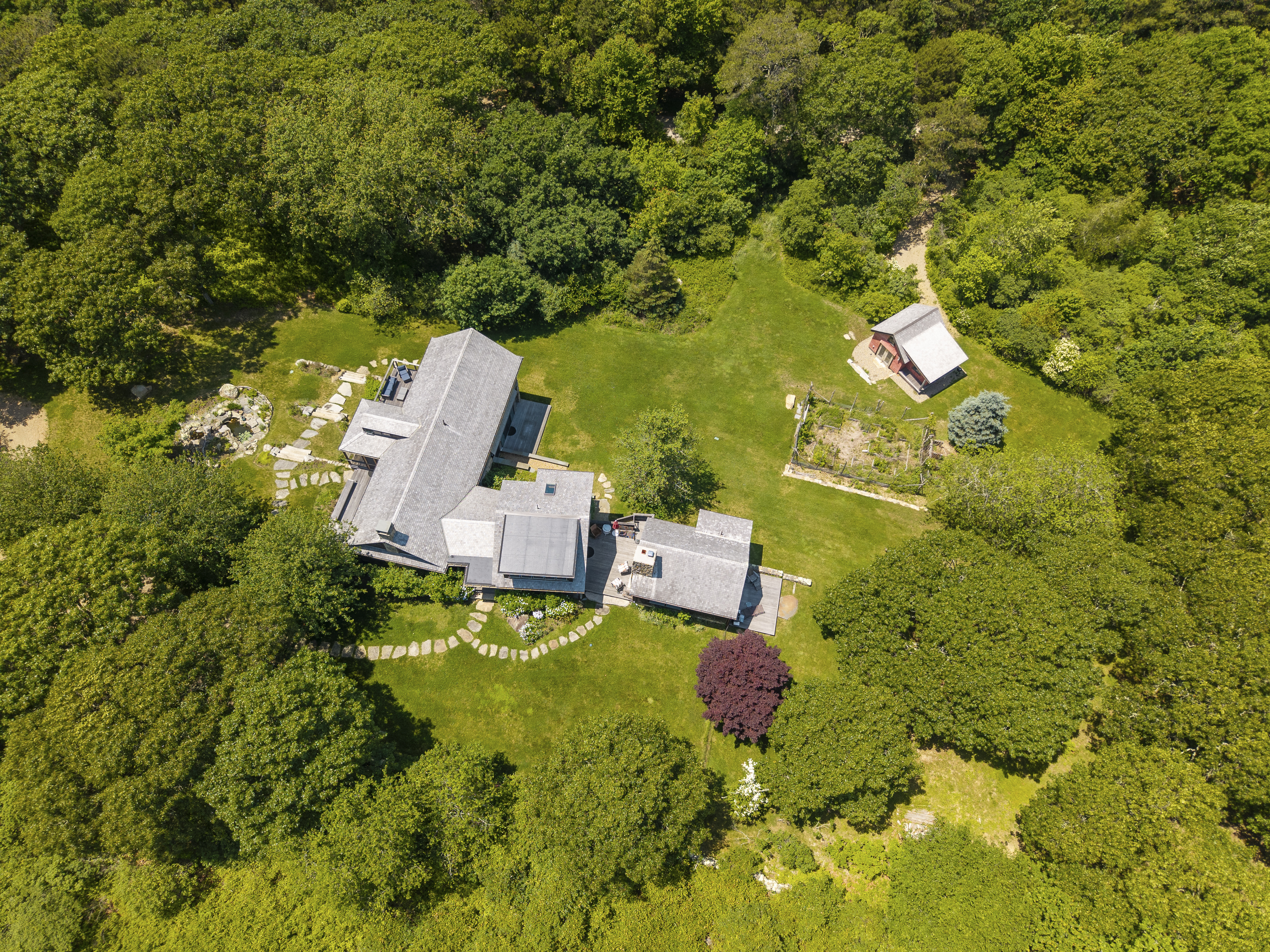 15 Old Farm Road Chilmark, MA 02535 - Photo 51 of 51 an aerial view of a house with swimming pool and lawn chairs