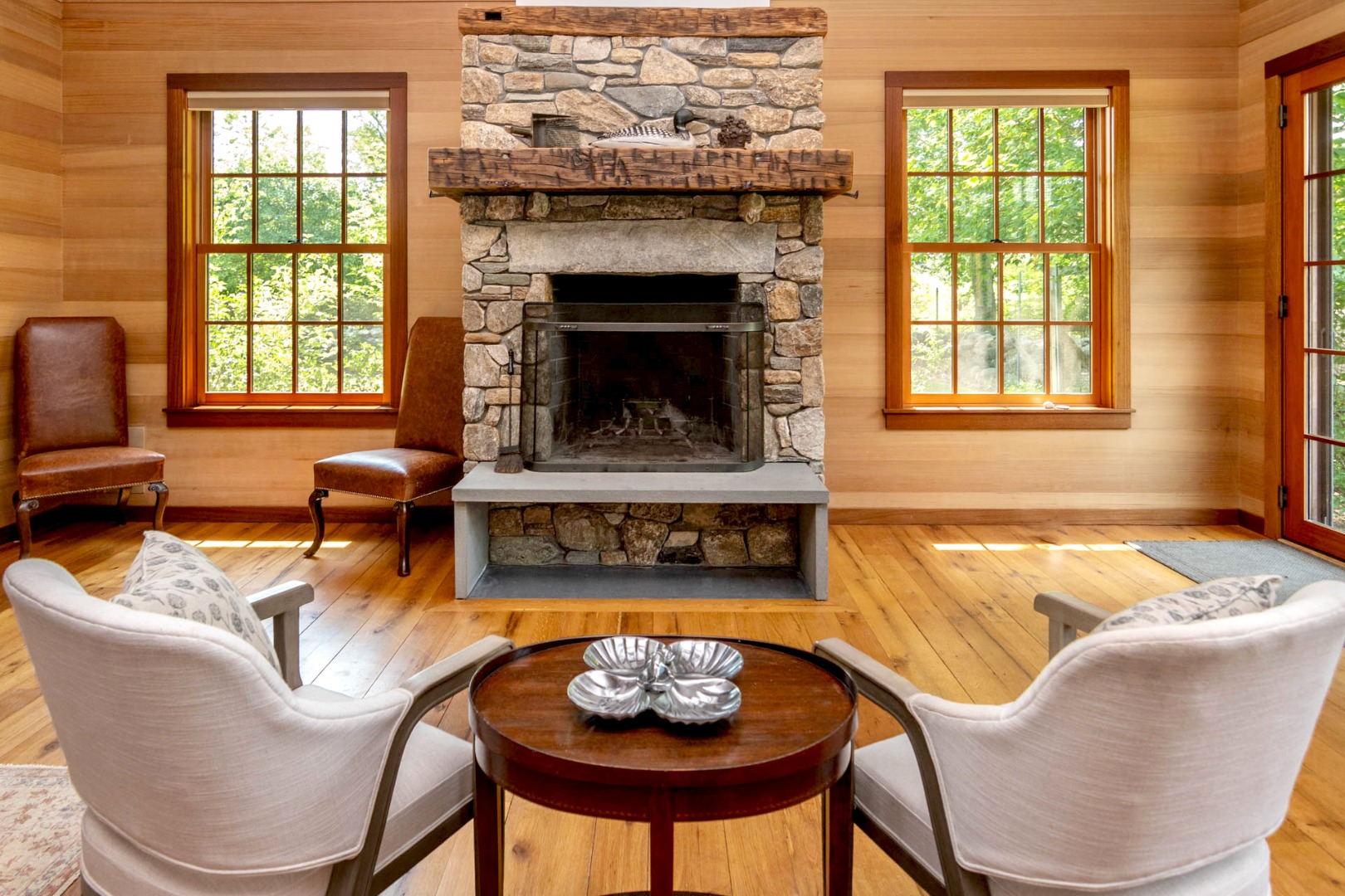 15 Old Farm Road Chilmark, MA 02535 - Photo 10 of 51 a living room with furniture and a fireplace
