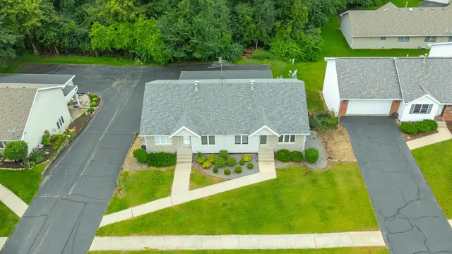 swimming pool view with a seating space