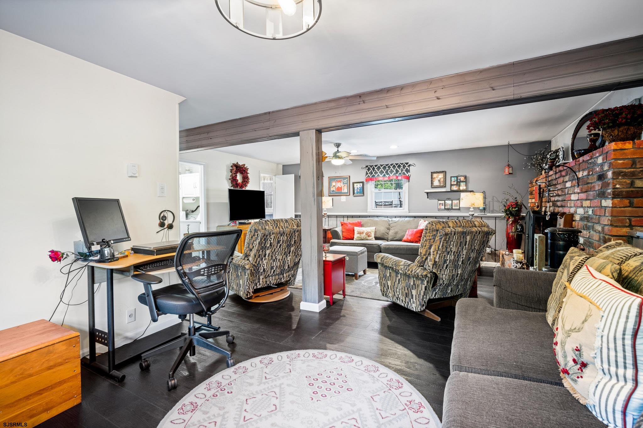 1326 Elwood Road Hammonton, NJ 08037 - Photo 11 of 36 a view of a livingroom with workspace and a couch