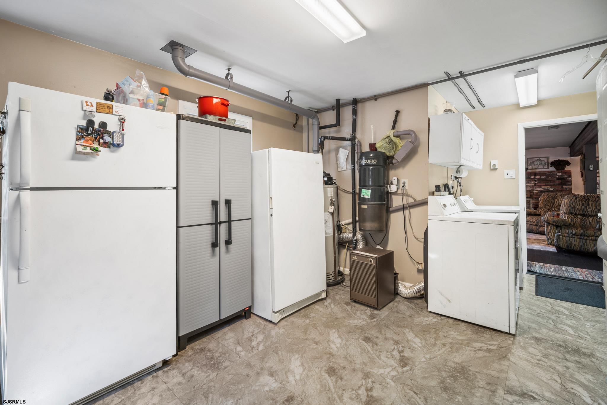 1326 Elwood Road Hammonton, NJ 08037 - Photo 14 of 36 a white refrigerator freezer and a stove sitting inside of a kitchen
