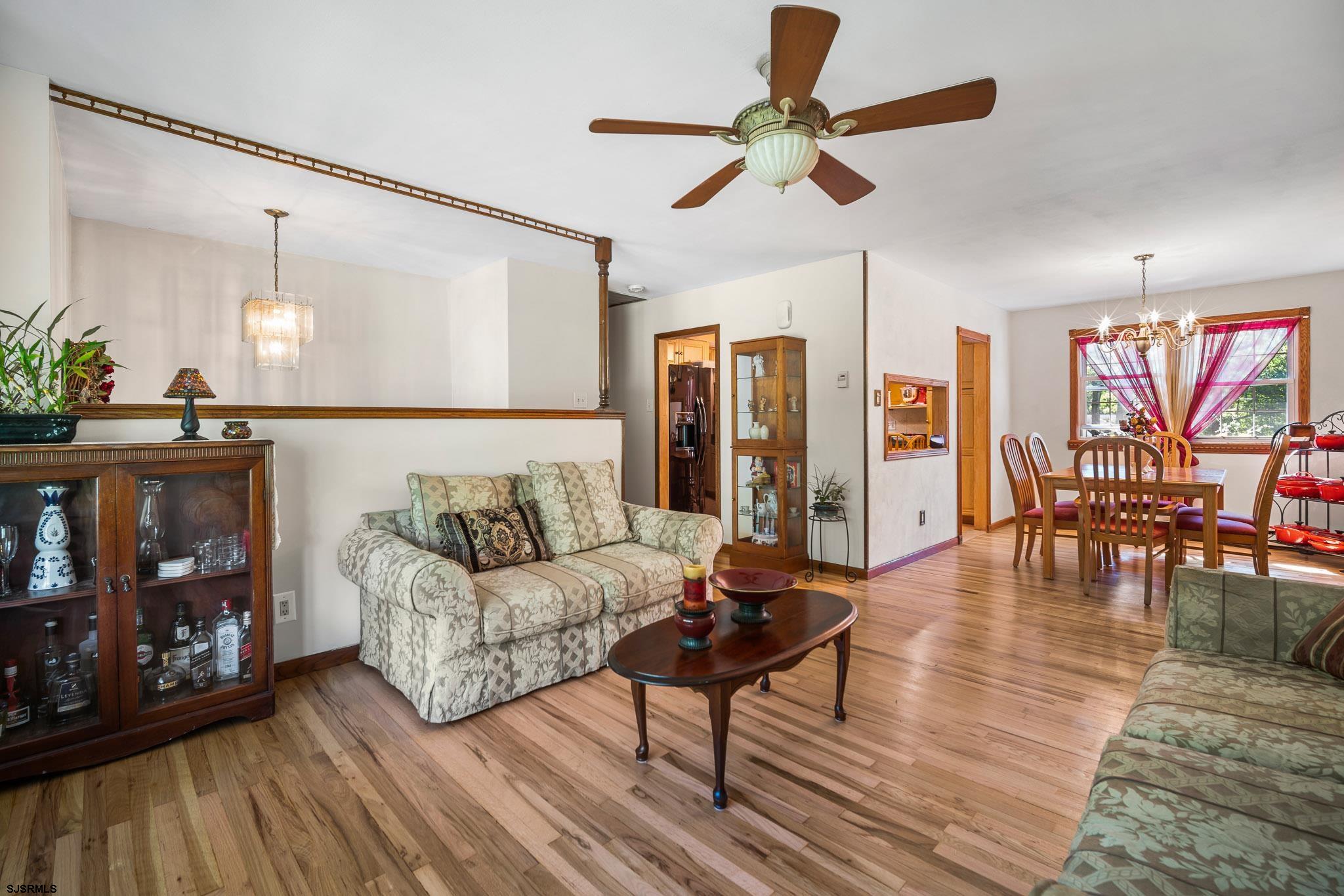 1326 Elwood Road Hammonton, NJ 08037 - Photo 16 of 36 a living room with furniture and wooden floor