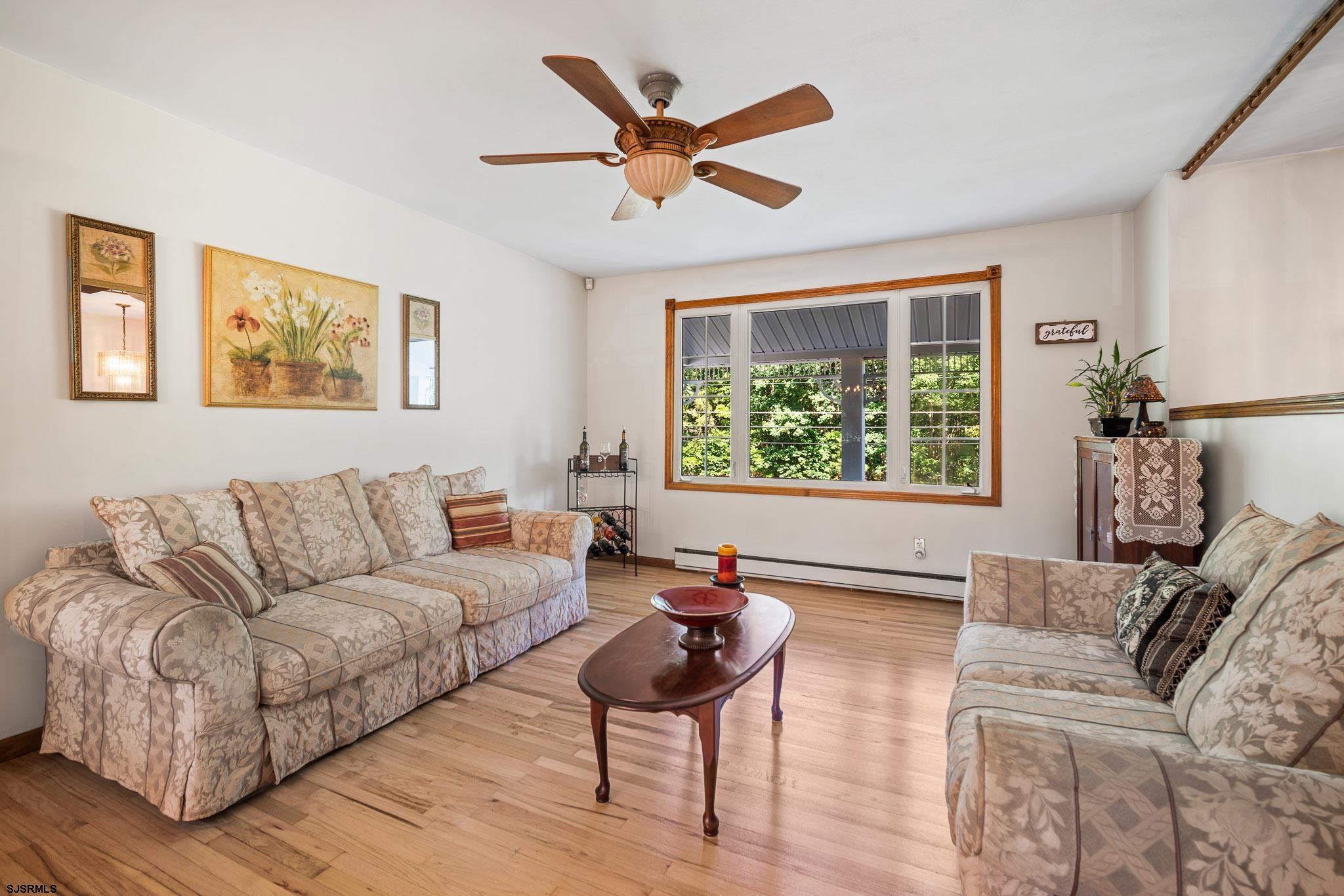 1326 Elwood Road Hammonton, NJ 08037 - Photo 17 of 36 a living room with furniture and a large window