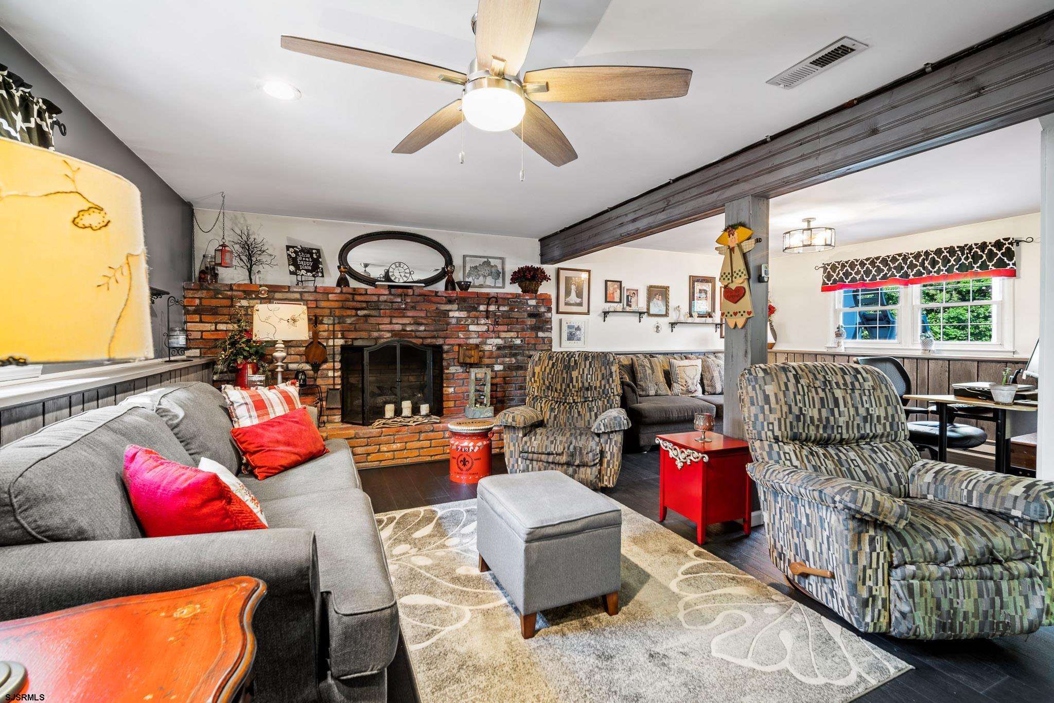 1326 Elwood Road Hammonton, NJ 08037 - Photo 8 of 36 a living room with lots of furniture and a large window