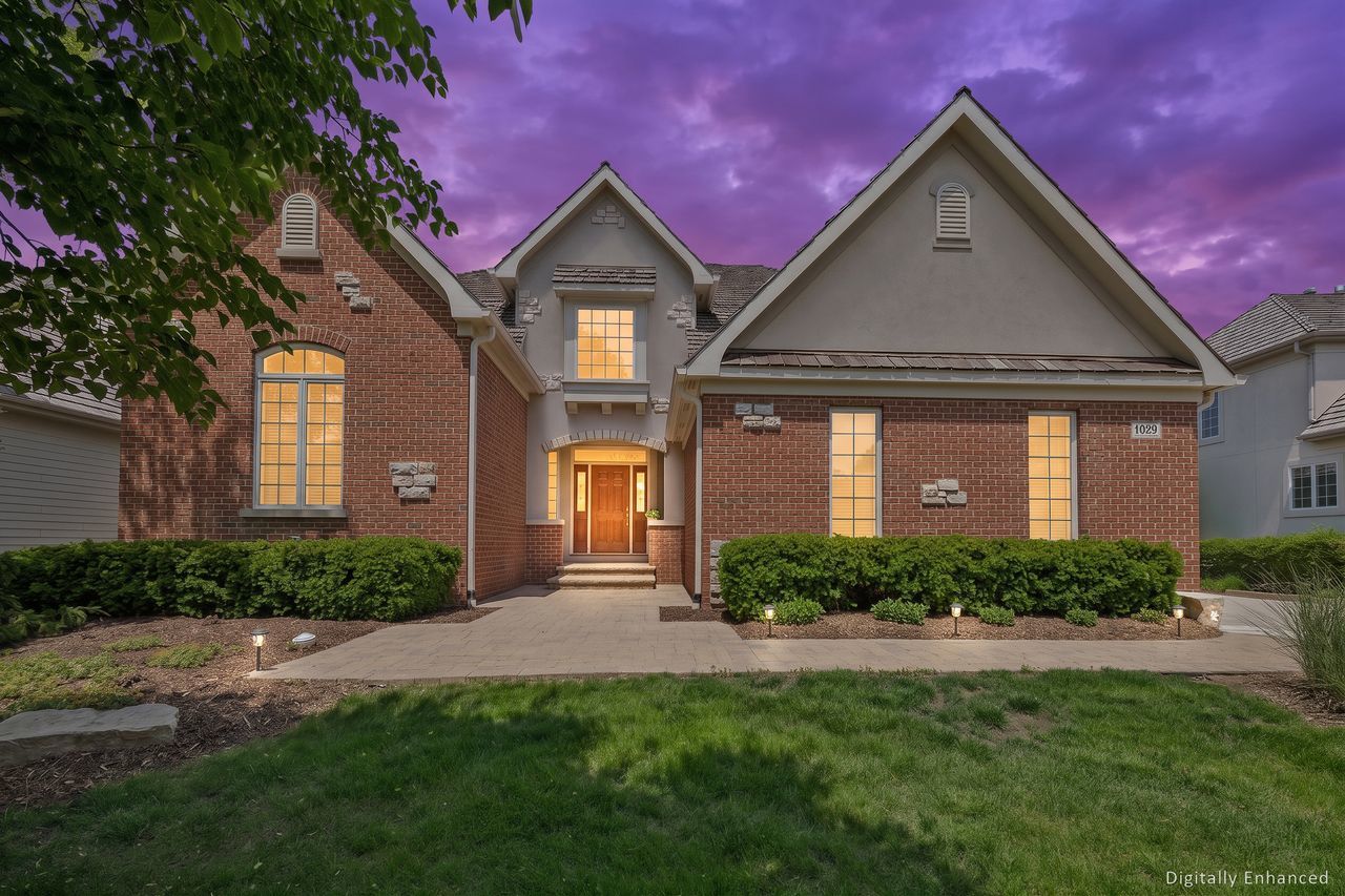1029 Ridgeview Drive Inverness, IL 60010 - Photo 2 of 58 a front view of a house with a yard