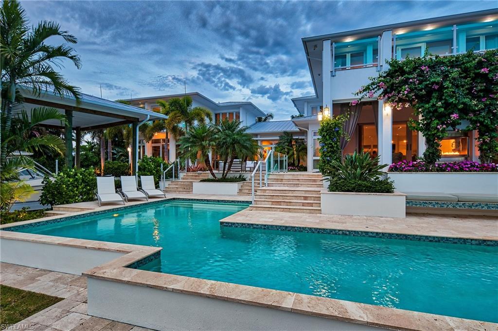 a view of a house with a swimming pool