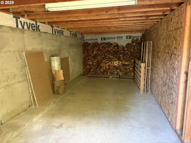 a view of a room with wooden door