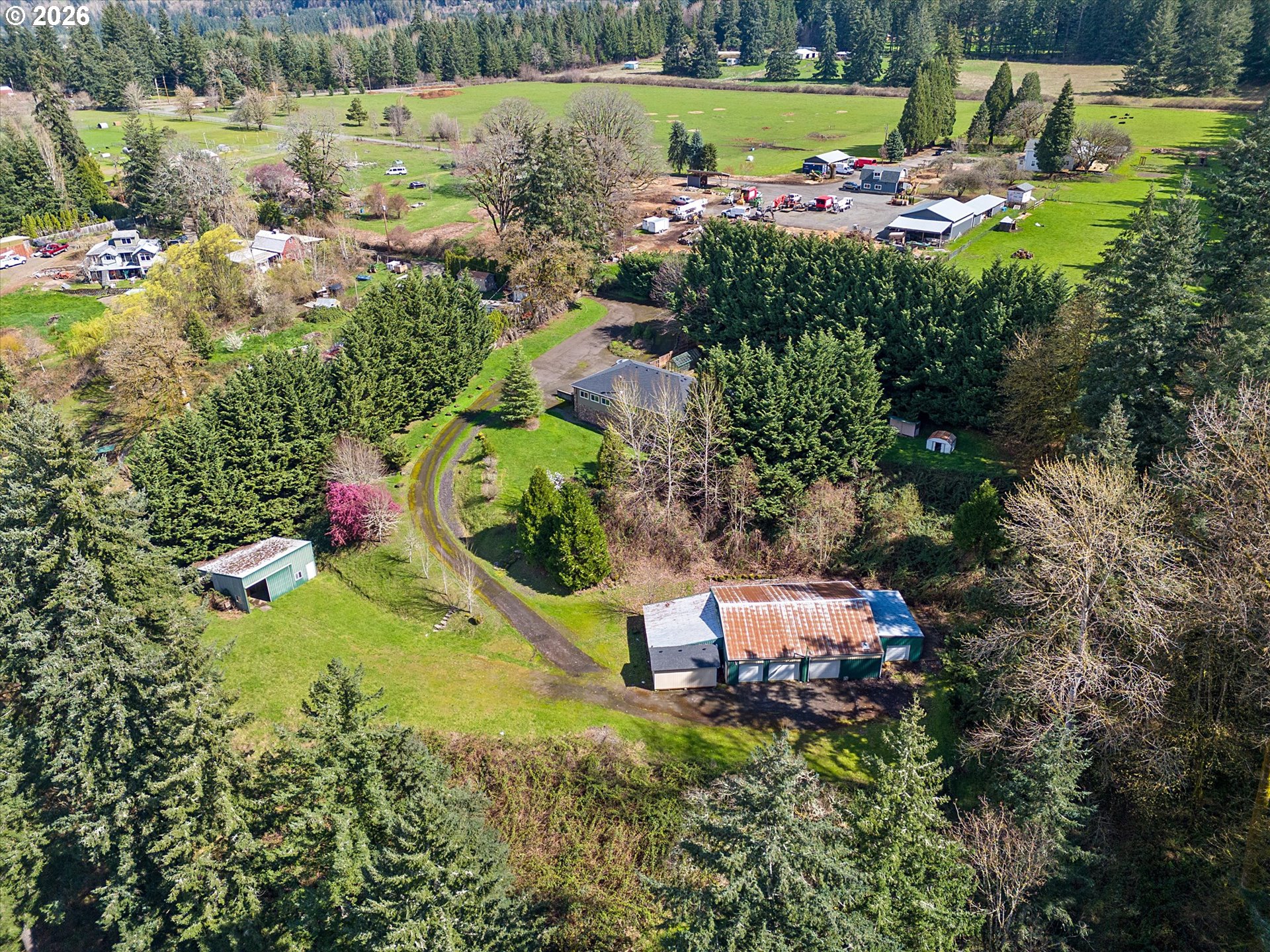 27741 Southeast Wallace Road Estacada, OR 97023 - Photo 46 of 48 a view of a lake with a yard and lake view