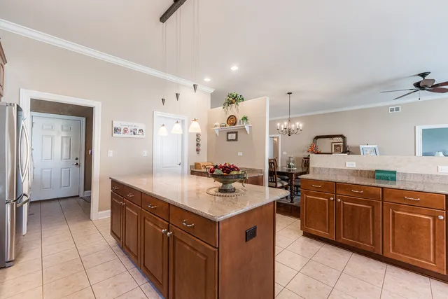 a kitchen with a sink and stove